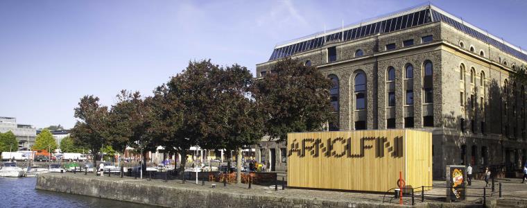 Summertime exterior of the Arnolfini on Bristol's harbourside.