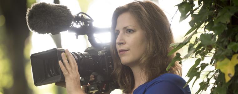 UWE Bristol graduate Lindsey Parietti, behind the camera filming a documentary.