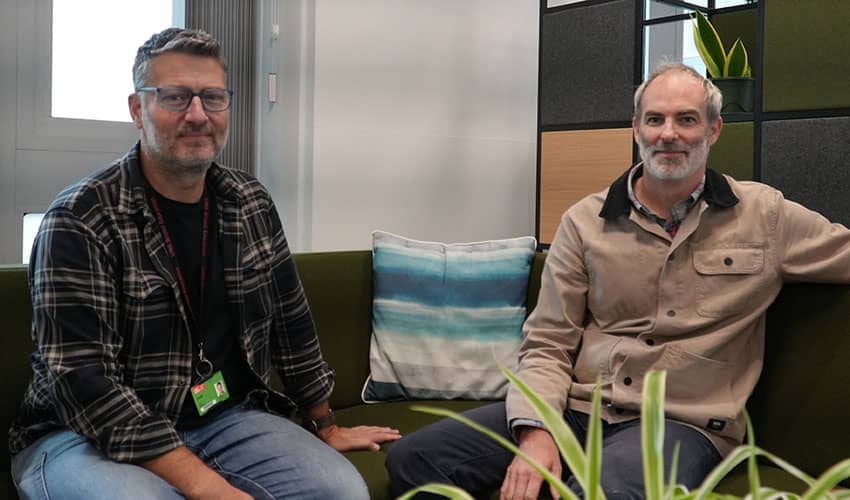 Dr Paul Redford (left) and Dr Ben Knight (right) seated on a sofa