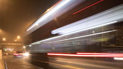 car lights on road with motion blurred effect