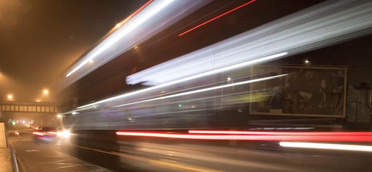 car lights on road with motion blurred effect