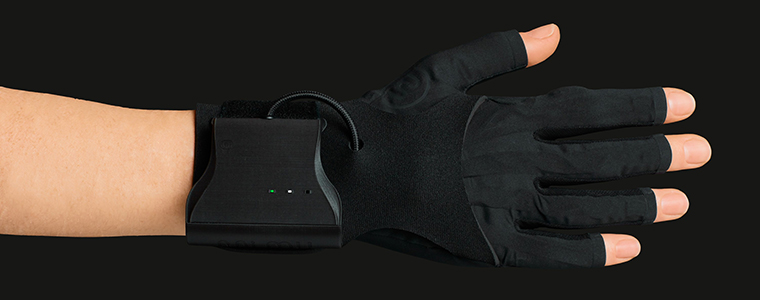 Hand wearing gestural music glove.