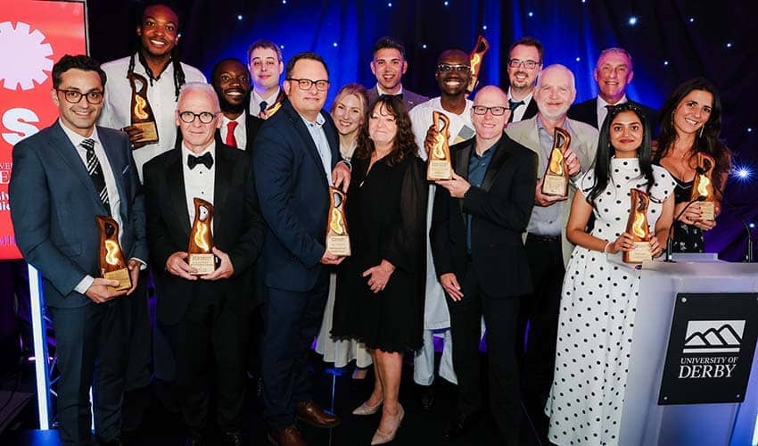 UWE Bristol’s Xavier Baker (EDI Business Partner) and Robiu Salisu (Assistant Director – EDI) collecting the award at the University Alliance Awards ceremony at the University of Derby alongside other winners