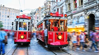 Red trams on a street in Istanbul