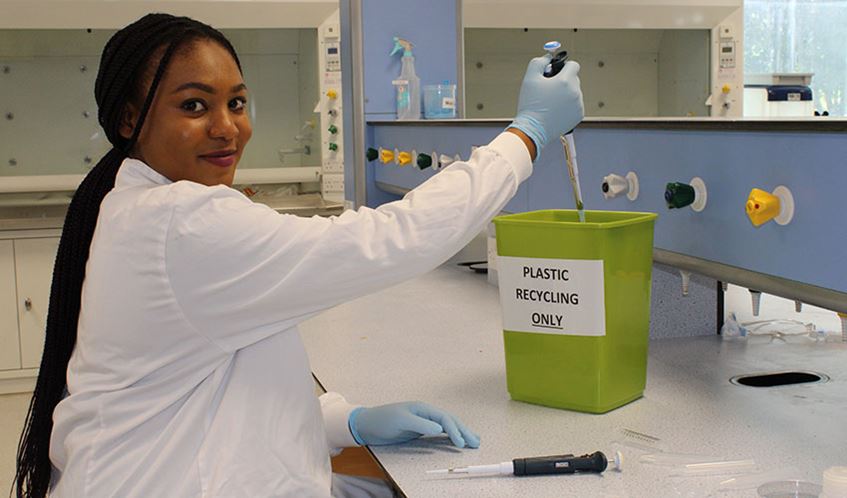 UWE Bristol student Perfect Edenojie recycling plastics in a science laboratory