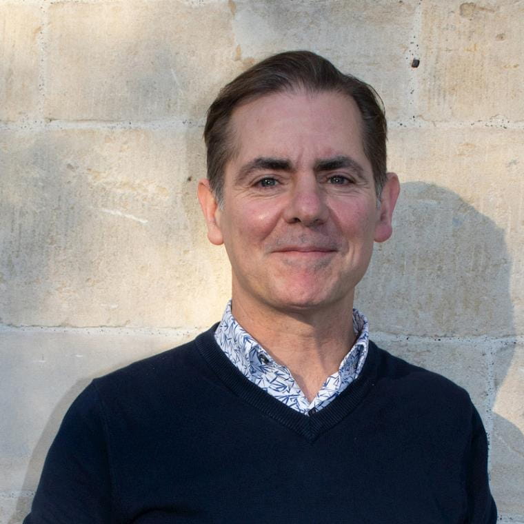 A photograph of Geoff Rich smiling