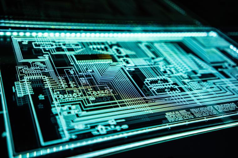 A turquoise electronic circuit board