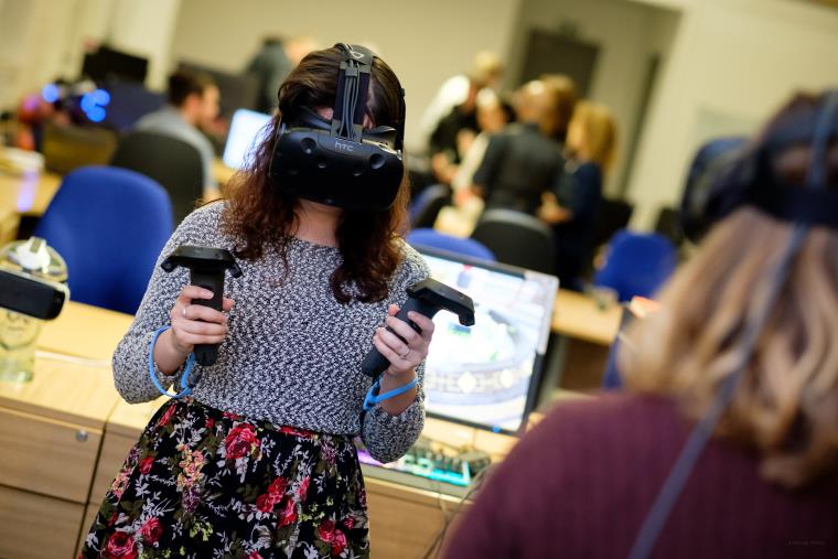 A woman using virtual reality(VR) equipment