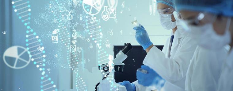 Two people in while lab clothing and face masks working with a flask, a syringe and a microscope.
