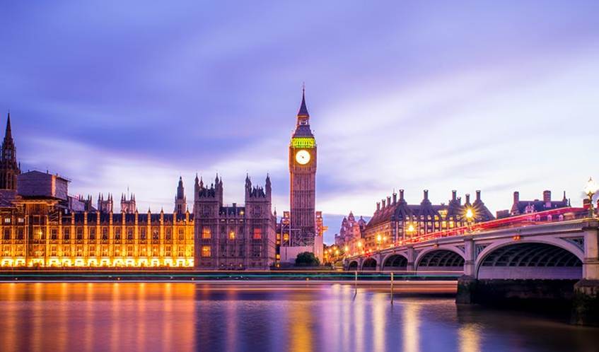 A view of the UK Parliament buildings across the River Thames