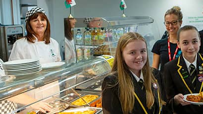 Schoolchildren in canteen.