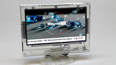 A screen made of clear plastic with 'Way2Learn' displayed on the screen.