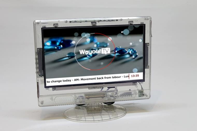 A screen made of clear plastic with 'Way2Learn' displayed on the screen.