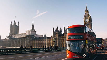 A London bus by the Houses of Parliament.