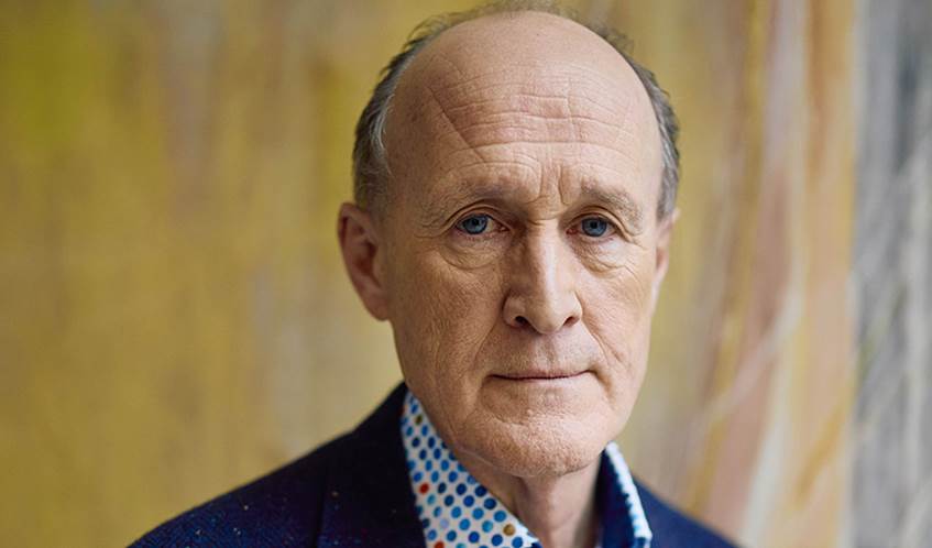 Photo shows image of Sir Peter Bazalgette