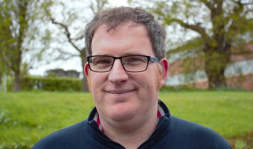 Dr Thom Oliver stands in the grounds of UWE Bristol