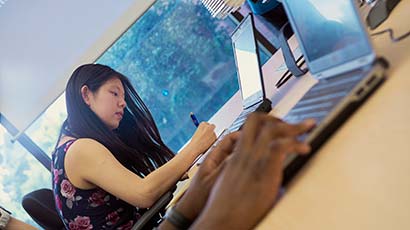 Student working on a laptop