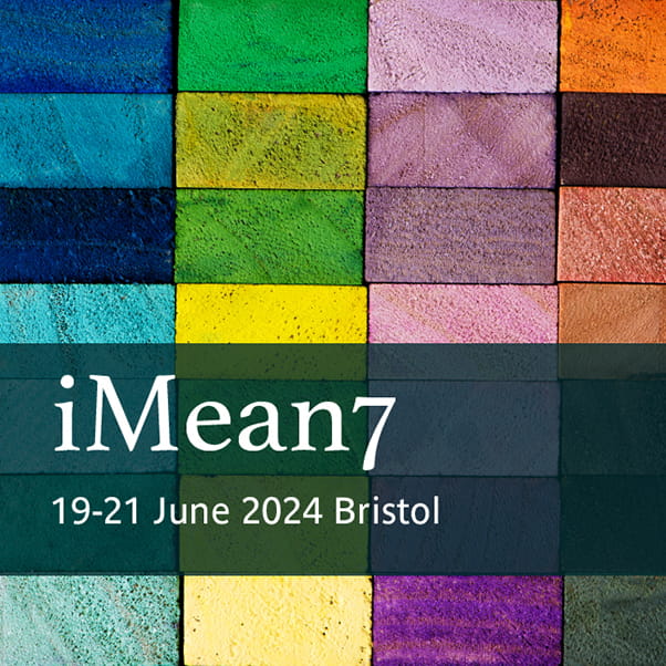 Multi-coloured bricks arranged in 5 by 6 grid with the words 'iMean7/19-21 June 2024/Bristol'