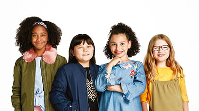 Image of 4 young girls with different ethnicities, moving from left to right: Black, Chinese, Brown and White.