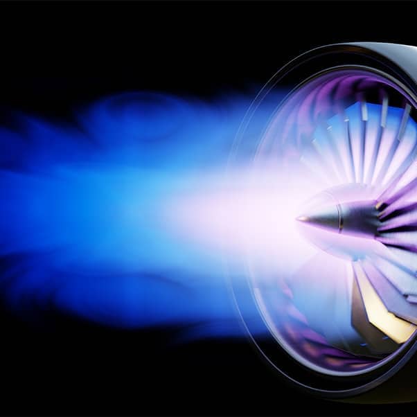 Glowing jet engine exhaust flame in dark background for aerospace and aviation technology concepts.