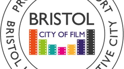 Bristol City of Film Supporters Stamp depicted with the words Bristol City of Film above a multi-coloured bar chart enclosed within 2 circles. In the space between the 2 circles are the words 'Proud to support Bristol Unesco Creative City.