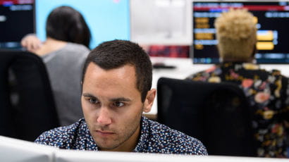 Students using computers in a study lab.