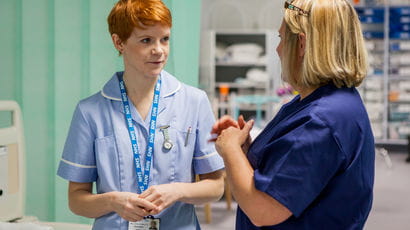 Two nurses talking