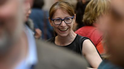 Person smiling in a crowd. Person smiling in a crowd.