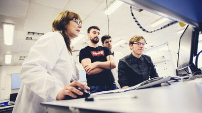 Researcher looks at data on a computer