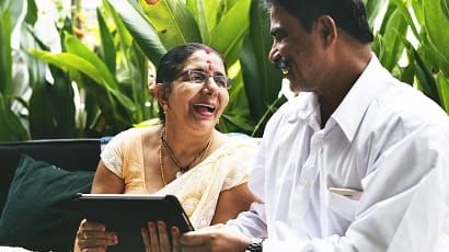 Asian people using a tablet computer