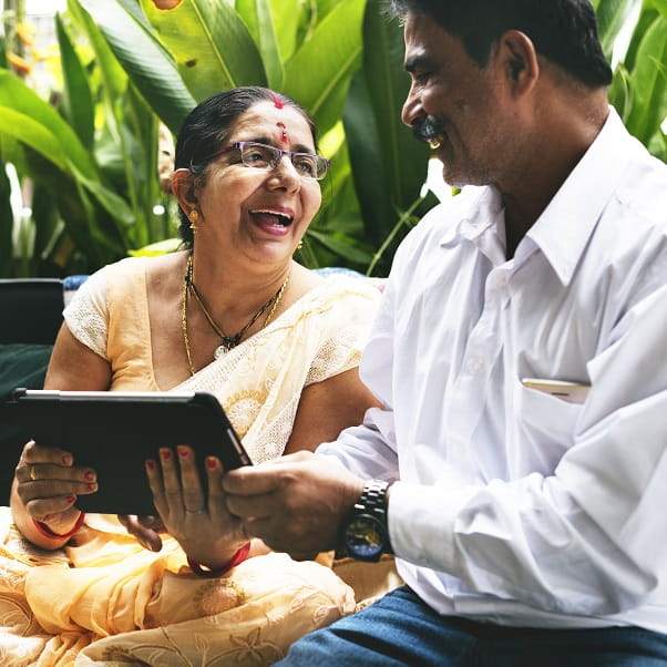 Asian people using a tablet computer