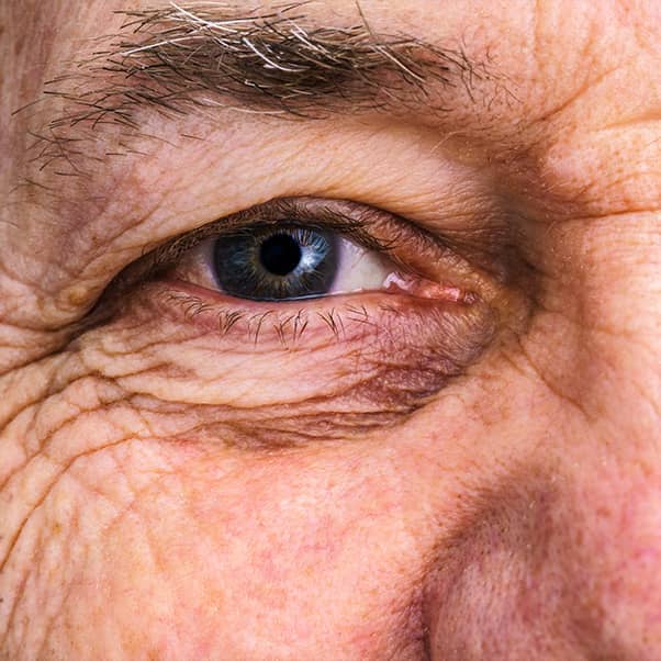 Close up a senior man's eye.