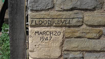 Flood level marked on a wall with the date March 20 1947