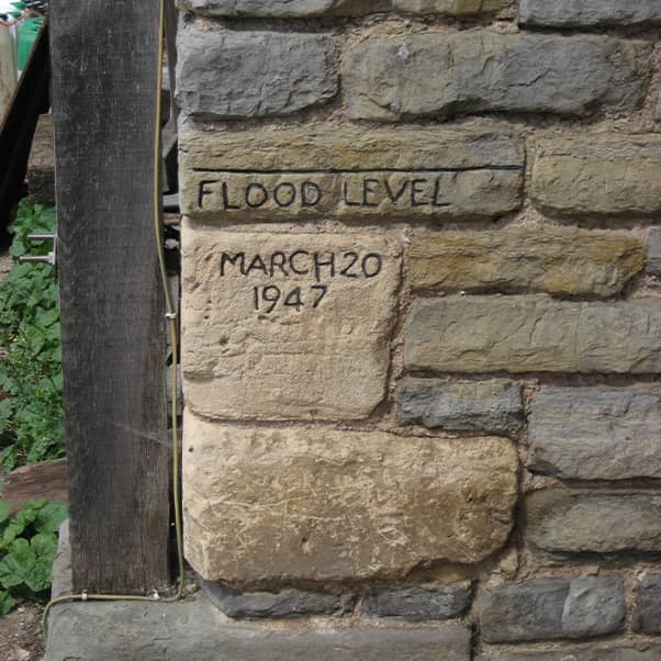 Flood level marked on a wall with the date March 20 1947