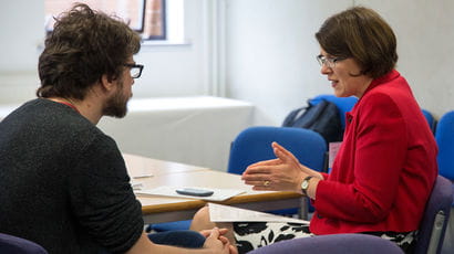 A student and a lecturer having a conversation