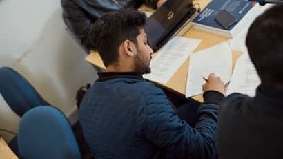 Student filling in exam paper