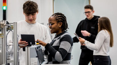 Engineering students in a lab.