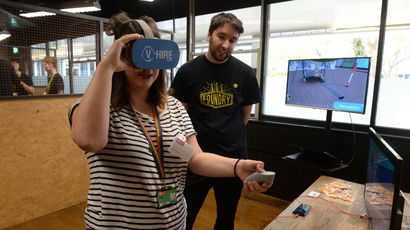 student trying out VR headset at The Foundry