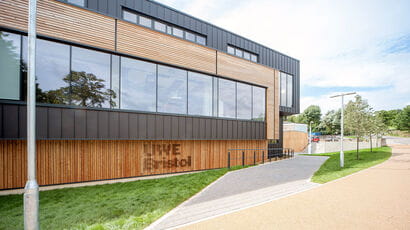 The entrance of the Bower Ashton Campus, showcasing modern architecture and vibrant surroundings.