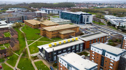 Aerial view of the Frenchay Campus, featuring its beautiful architecture and green spaces.