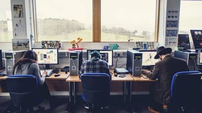 Three students using computers at Bower Ashton Campus