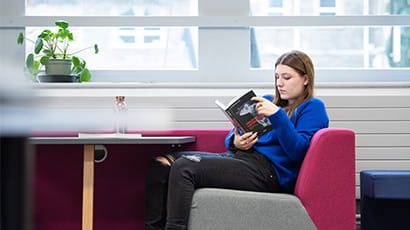 Student reading a book