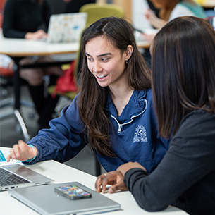 Students working on a laptop