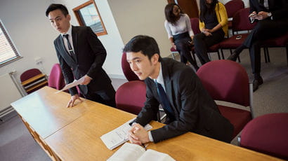 Law student with books on law