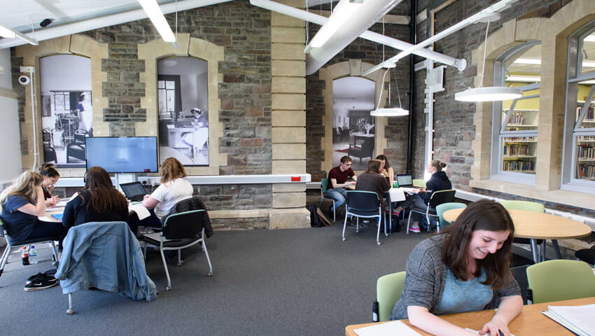 Students working in the West Wing of Glenside Library.