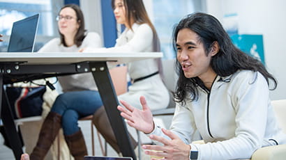 Student talking in a group