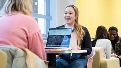 Students working on a laptop