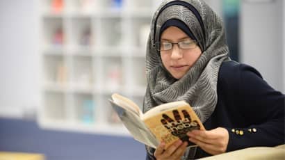 Student reading a book.