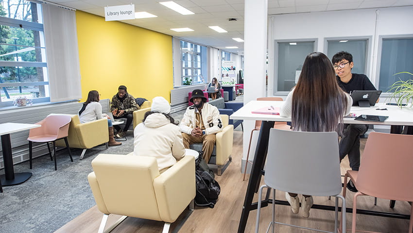 Students working and chatting in Glenside Library Lounge