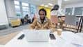 Student working on laptop in Glenside Library Lounge